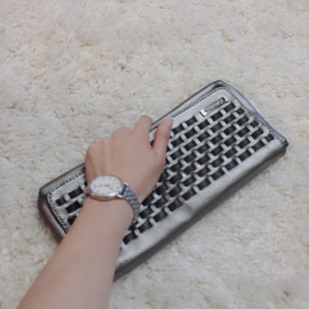 Keven Kline  pearlised clutch